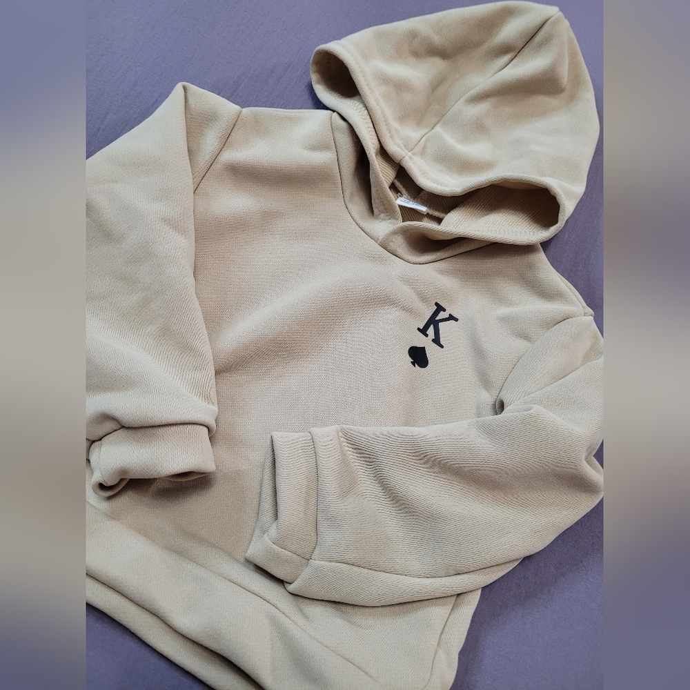 ✨️3/$25✨️ Baby Beige Hoodie With King Of Spades Symbol